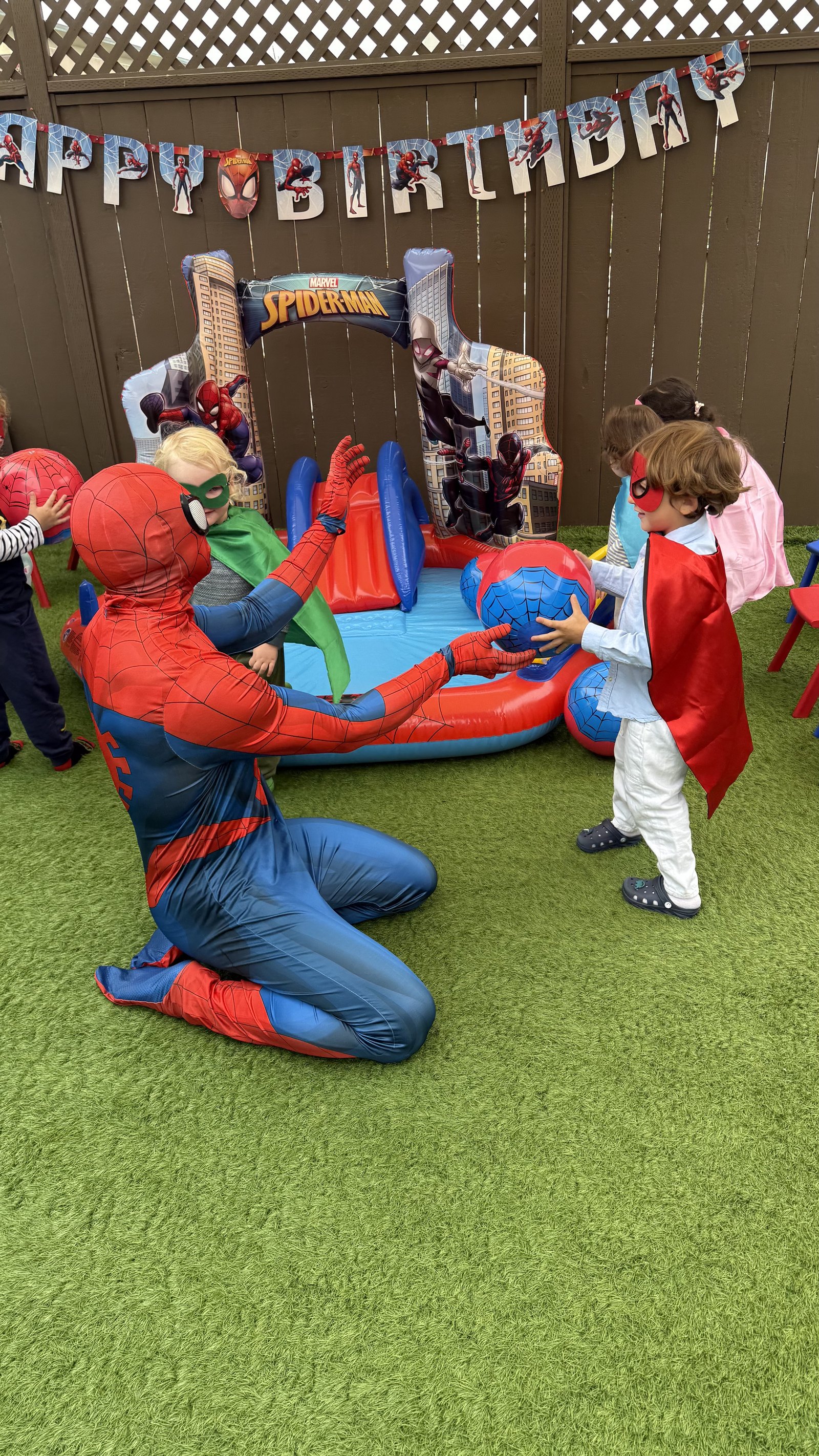 Children enjoying a special character visit outdoors